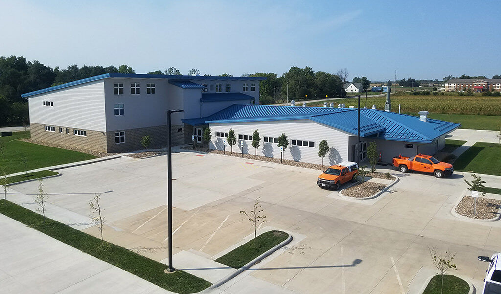 aerial view of recently complete contemporary iDOT facility and parking lot in Fairfield, IA